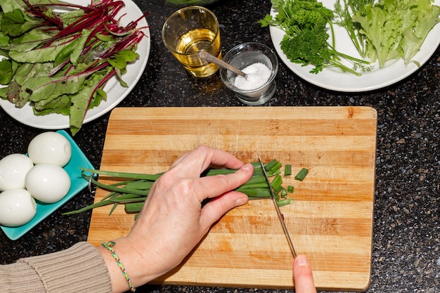 Hands preparing meal